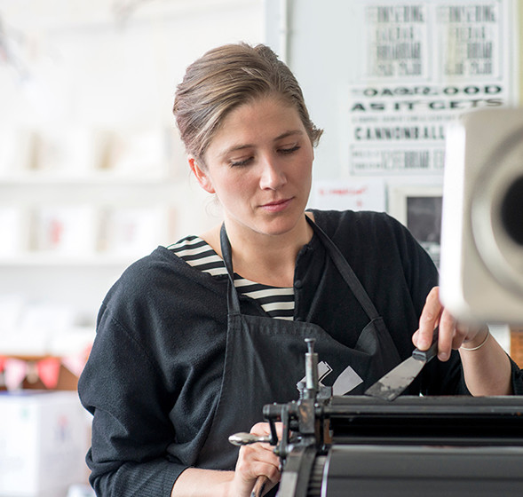 Woman doing printing from own company