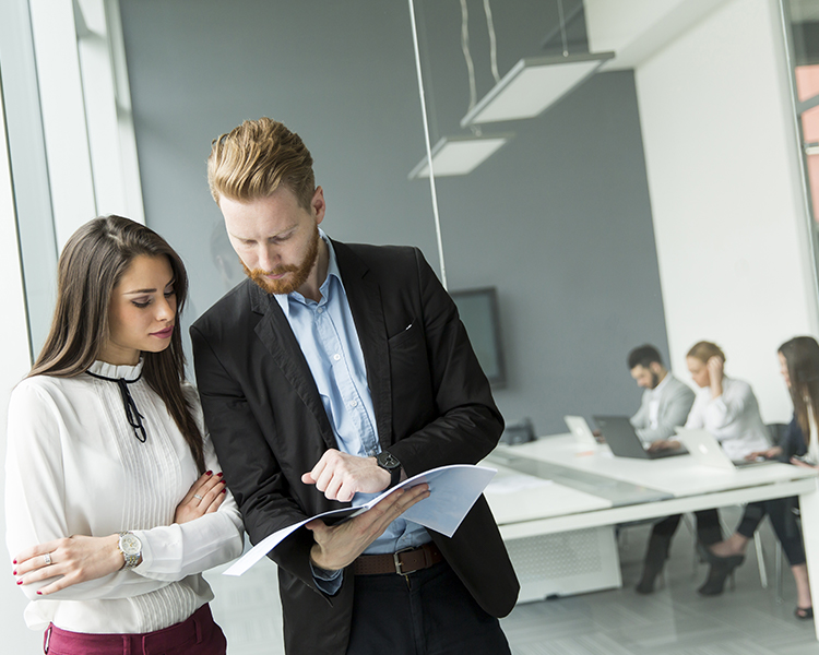 Man working with woman